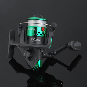 Fishing reel with green accents on a black background