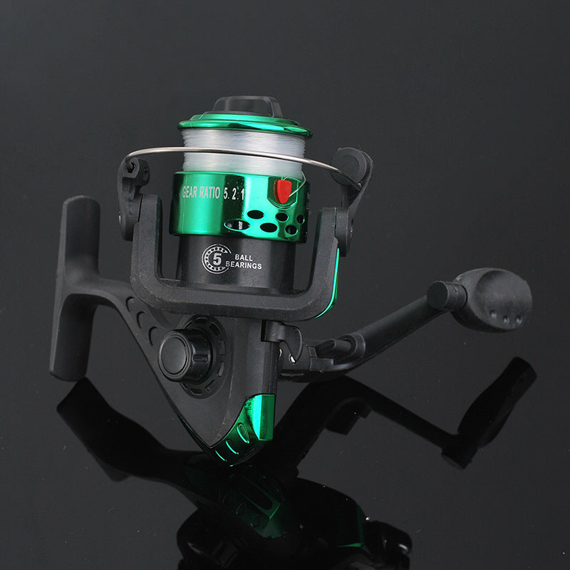 Fishing reel with green accents on a black background