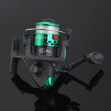 Fishing reel with green accents on a black background