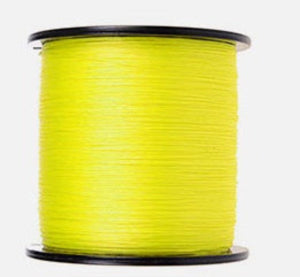 Spool of yellow thread on a white background