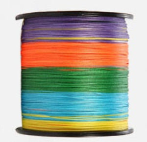 Spool of colorful fishing line on a white background