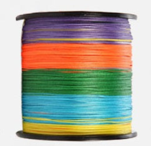 Spool of colorful fishing line on a white background