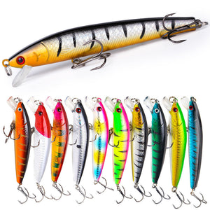 Assorted fishing lures with measurements on a white background