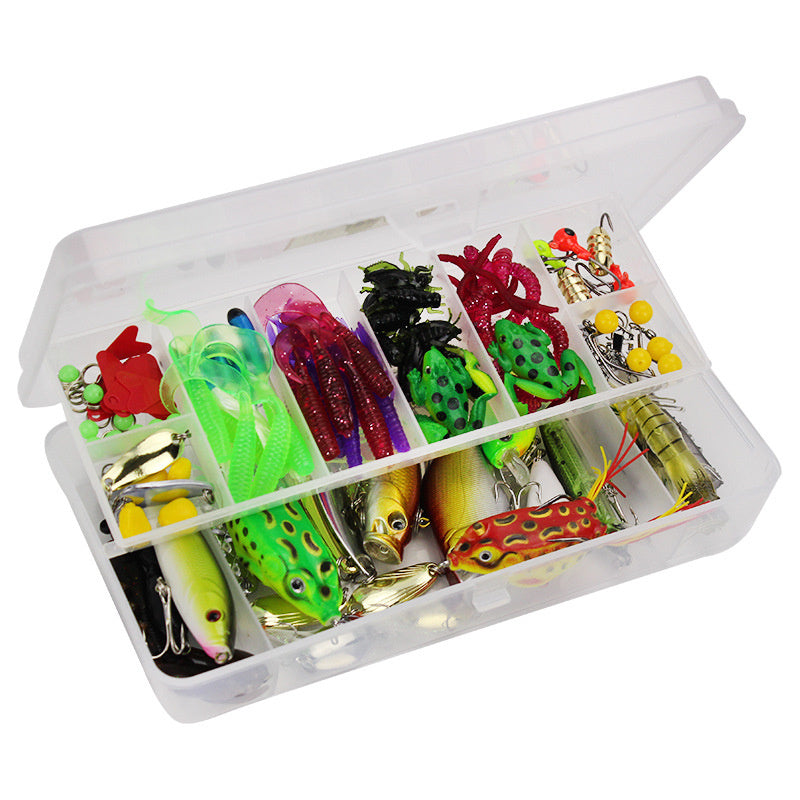 Assorted fishing lures in a clear box on a white background