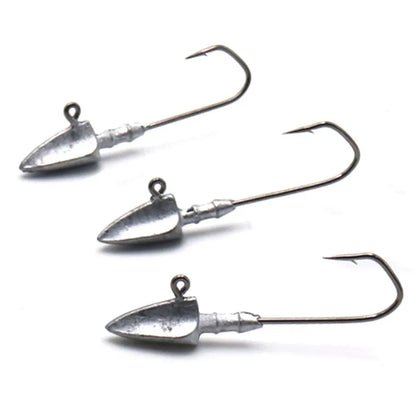 Three metal fishing jigs on a white background