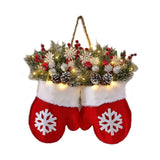 Decorative Christmas stocking with mittens, lights, and festive elements on a white background