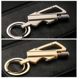 FireMate™ Metal keychain with carabiner and tool on a black leather surface