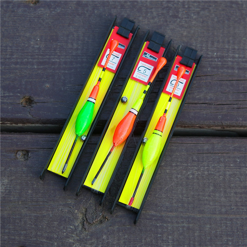 Fishing accessories organized in a lightweight foam suit outdoors.