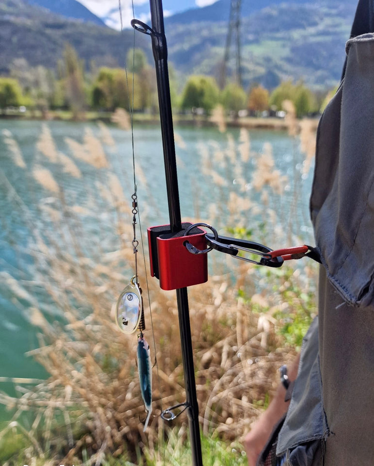 Lightweight and portable Fishing Rod Clip Holder on a fishing bag.
