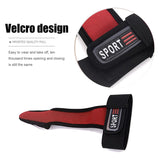 Red and black wrist support strap with velcro design on a white background