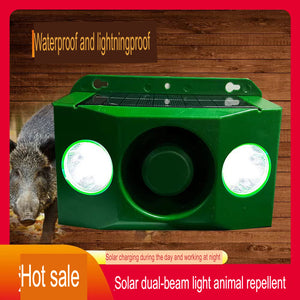 Ultrasonic animal repellent device placed in a garden to deter pests